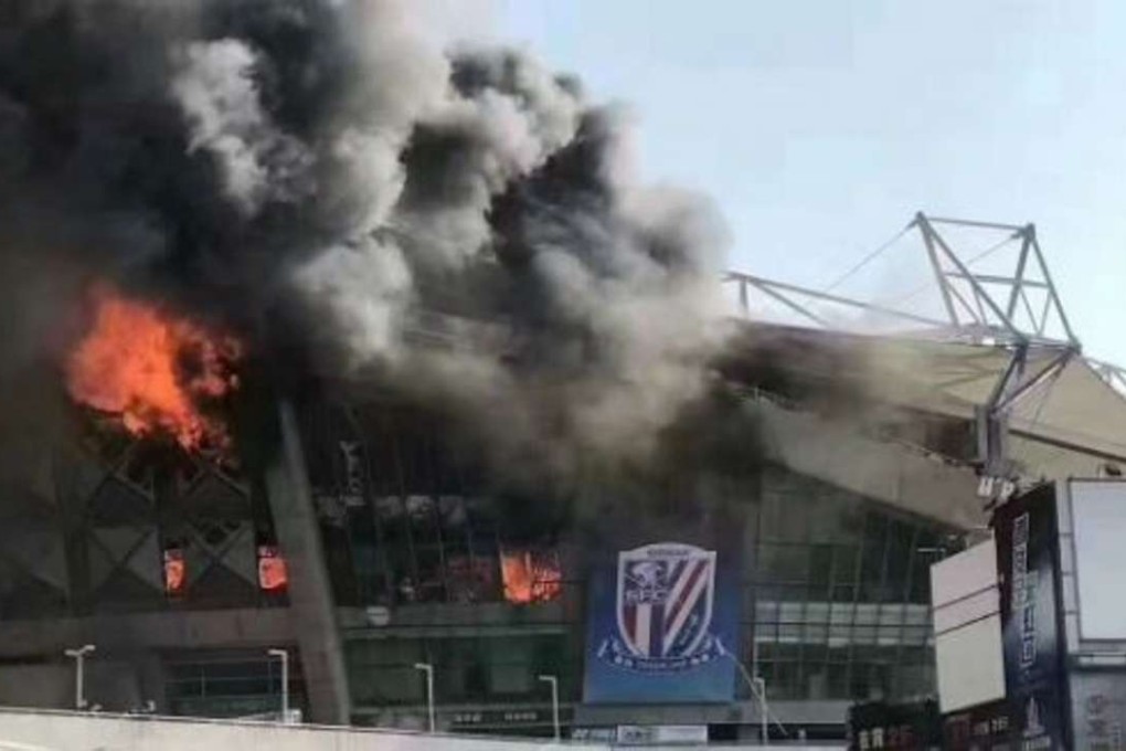 A fire rips through Shanghai Shenhua’s Hongkou Stadium on Tuesday morning. Photo: Twitter