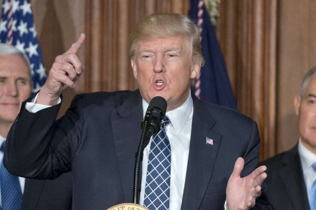 United States President Donald J. Trump makes remarks prior to signing an Energy Independence Executive Order at the Environmental Protection Agency (EPA) Headquarters in Washington, DC. The order reverses the Obama-era climate change policies of his predecessor. Photo: EPA
