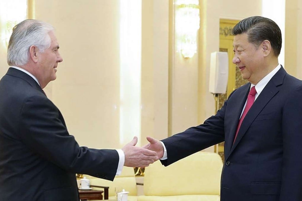 US Secretary of State Rex Tillerson (L) and Chinese President Xi Jinping shake hands at the Great Hall of the People in Beijing as both sides prepare for a summit meeting in Florida in the first week of April. Photo: Kyodo