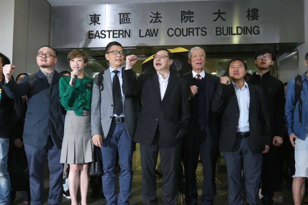 (From left) Raphael Wong Ho-ming, Shiu Ka-chun, Tanya Chan Suk-chong, Chan Kin-man, Benny Tai Yiu-ting, Chu Yiu-ming, Lee Wing-tat, Tommy Cheung Sau-yin and Eason Chung Yiu-wah greet supporters outside court. Photo: Dickson Lee