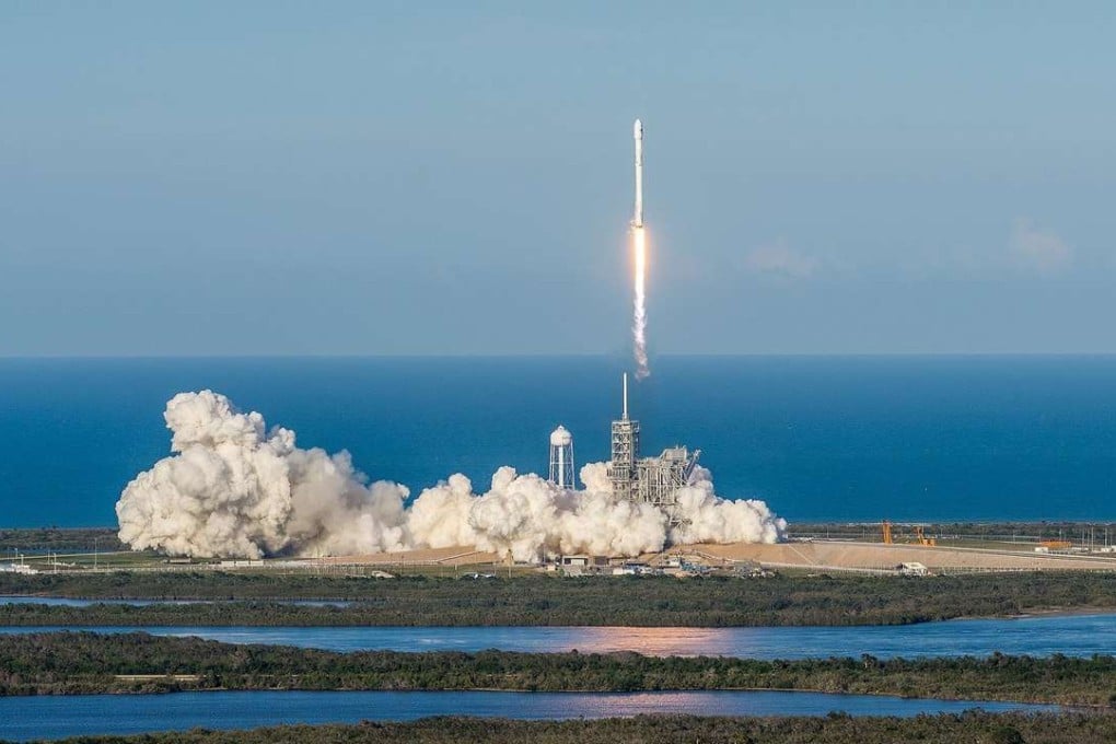 A handout photo made available by SpaceX shows the launch of the re-used Falcon 9 rocket at the Kennedy Space Center near Cape Canaveral, Florida, on Thursday. Photo: EPA