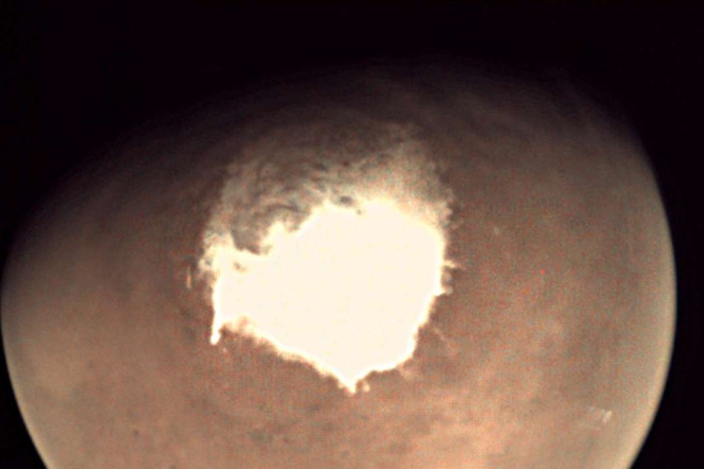 The planet Mars as seen by the webcam on the Mars Express orbiter. Solar winds are believed by scientists to have stripped what was once a warm, wet atmosphere. Photo: European Space Agence via AFP