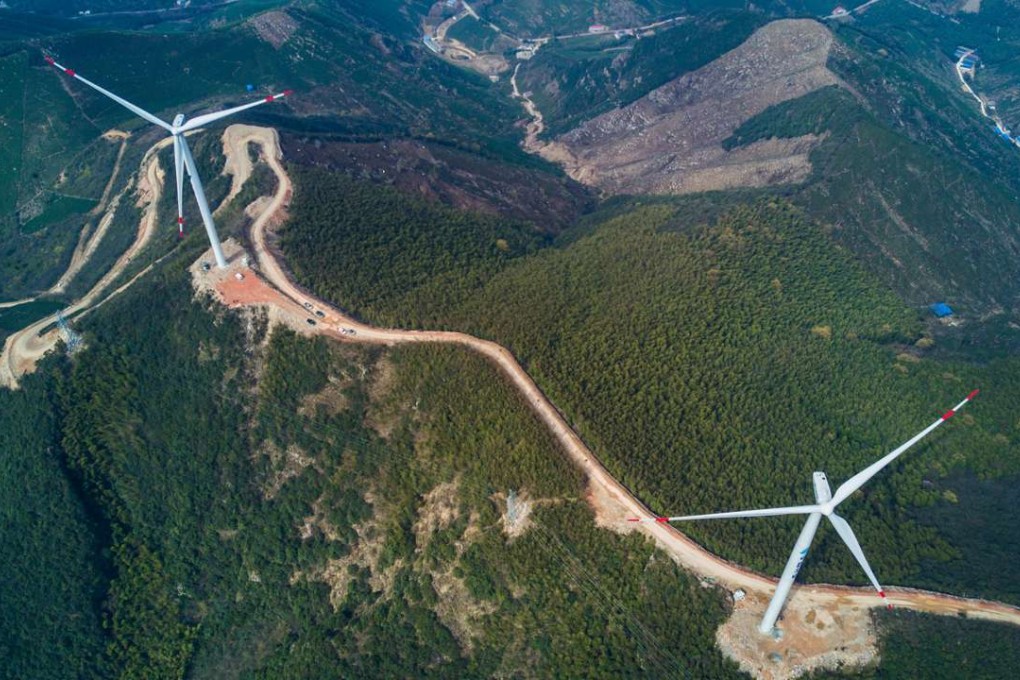 Wind turbines on the hills of Changxing county, Zhejiang province. The world’s second-biggest economy is evolving into the undisputed global leader in the wind and solar sectors, via an unprecedented wave of investment in manufacturing, and technology research and development. Photo: Xinhua