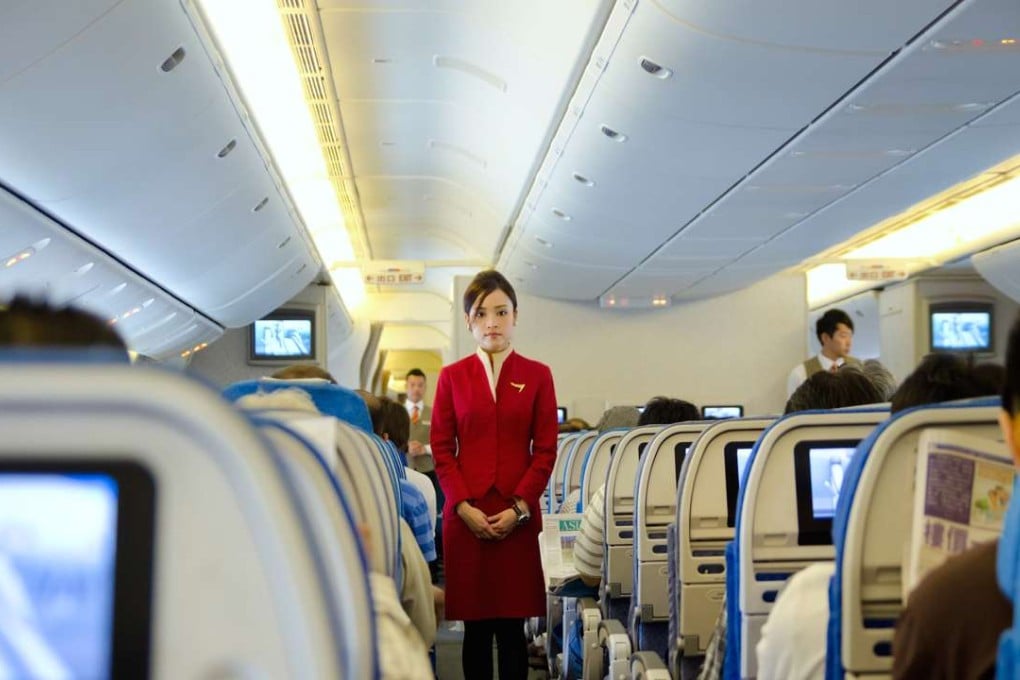 In its newly upgraded economy cabin, Cathay Pacific is offering a 12-inch entertainment screen. Photo: Shutterstock