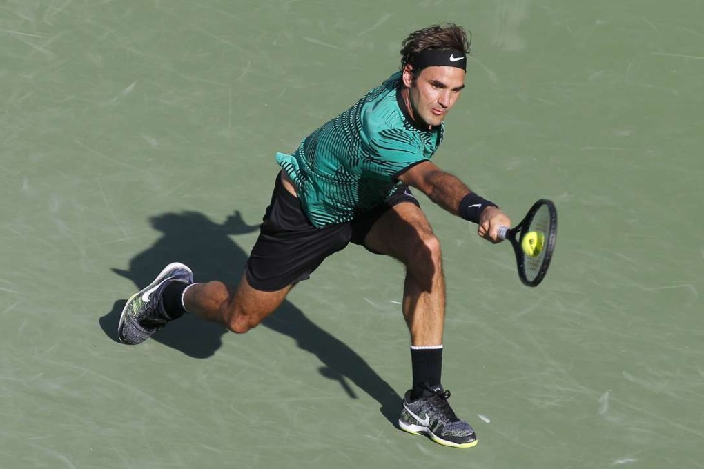 Switzerland’s Roger Federer returns a shot during his Miami Open quarter-final victory over Tomas Berdych. Photo: TNS