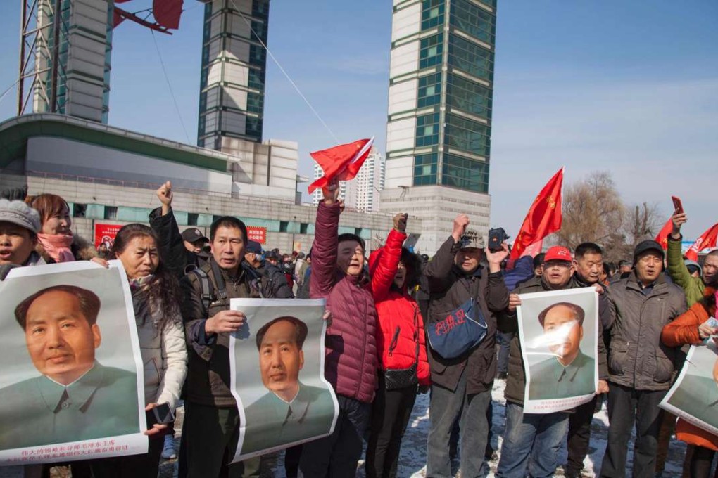 Chinese protesters hold Mao Zedong posters as they call for a boycott of South Korean goods in Jilin. Photo: AFP