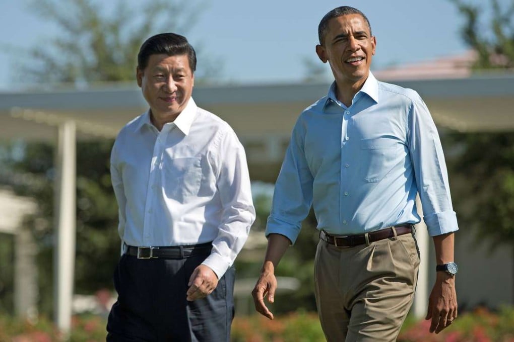 Xi Jinping and Barack Obama take a stroll together at Sunnylands in June 2013. Photo: AP