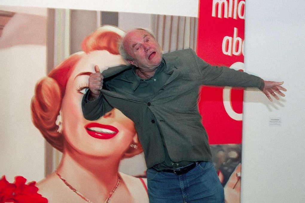 A 2001 photo of American pop artist James Rosenquist joking in front of his painting called Joan Crawford says. Photo: AFP