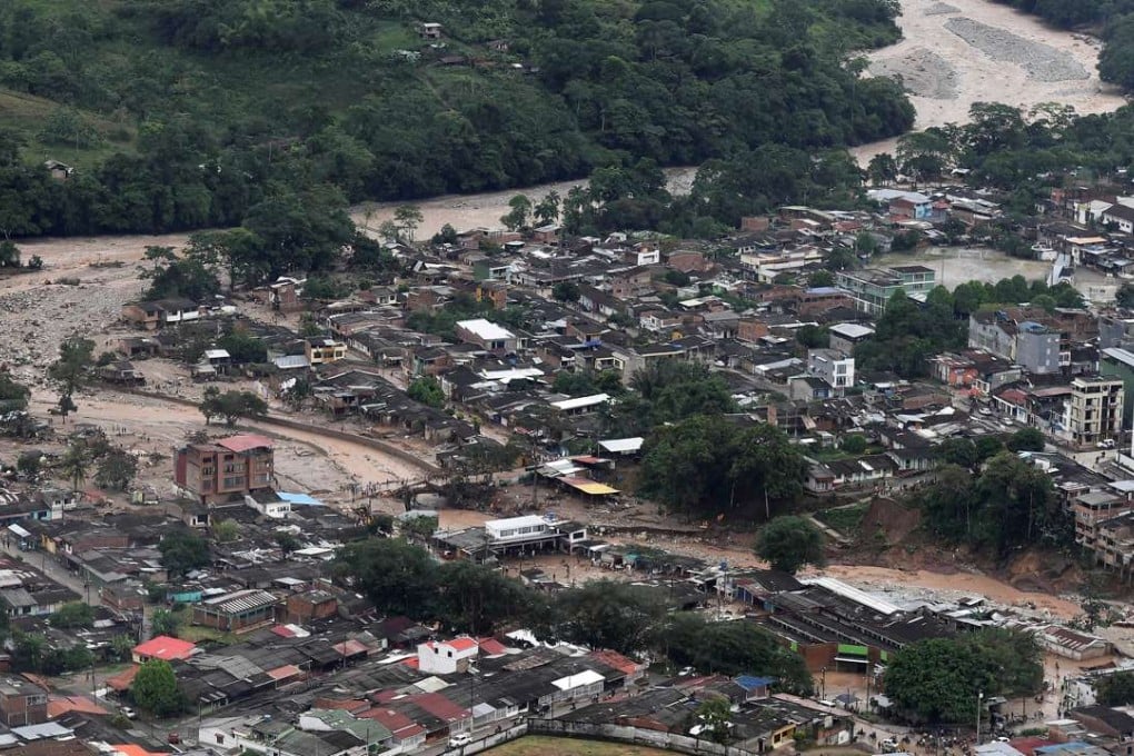 A flooded area after heavy rains caused several rivers to overflow, pushing sediment and rocks into buildings and roads in Mocoa. Photo: Reuters