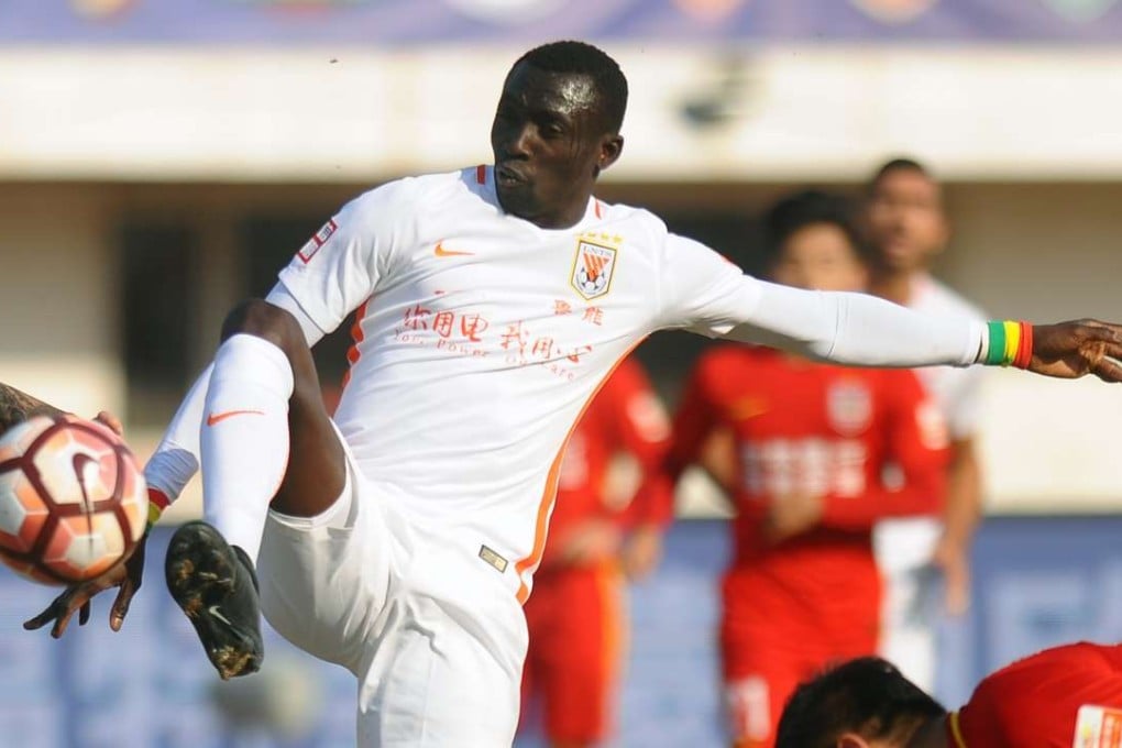 Papiss Cisse in action for Shandong Luneng against Changchun Yatai. Photo: Xinhua
