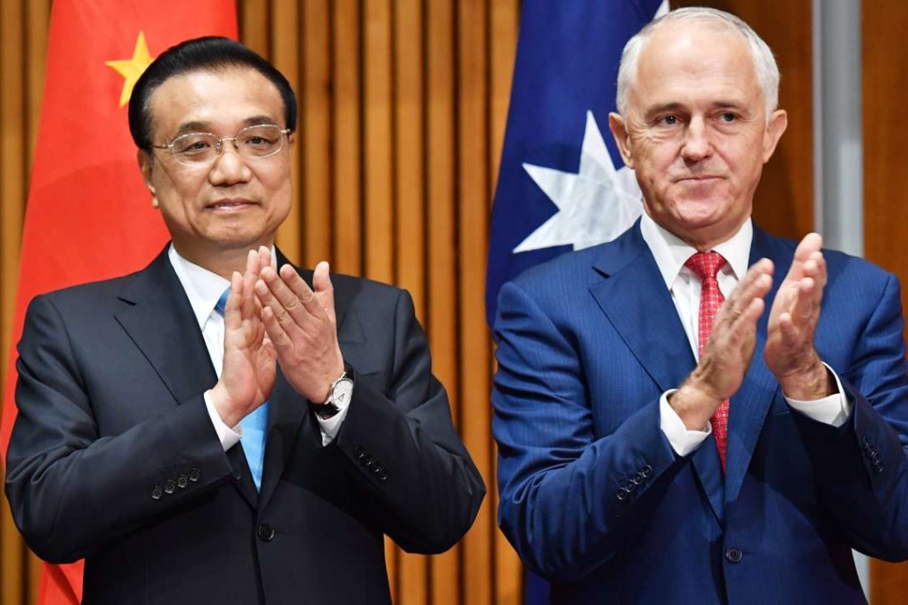 Chinese Premier Li Keqiang and Australian Prime Minister Malcolm Turnbull attend a signing ceremony in Canberra, Australia, last week. Photo: EPA