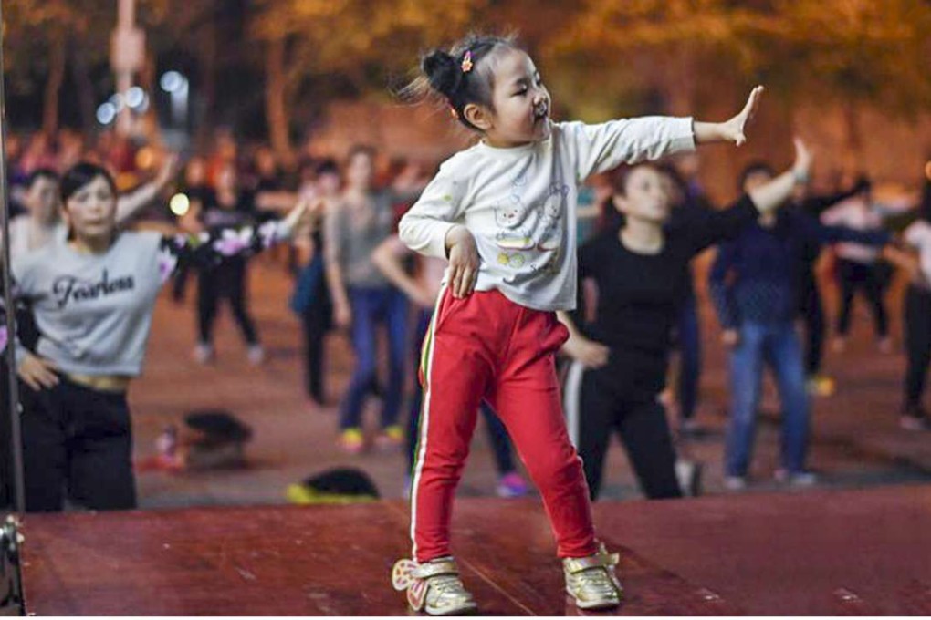 Five-year-old Dailan Jingyi leads her square dancers in Chongqing. Photo: Handout