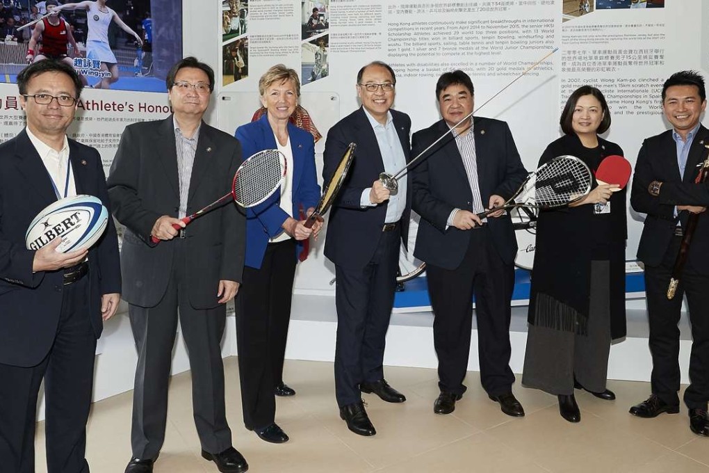 Lam Tam-fai (fourth left) with his management team at the Hong Kong Sports Institute. Photo: HKSI
