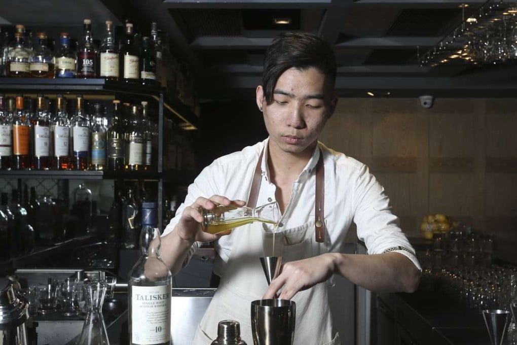 Lok Cheung Kwan-lok prepares his Grey & Gold at Angel’s Share in Central. Photo: K. Y. Cheng