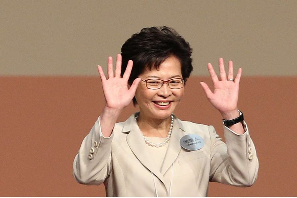 Hong Kong chief executive-elect Carrie Lam, seen here waving after she was declared the winner on March 26, must try and assemble a credible administration. Photo: EPA