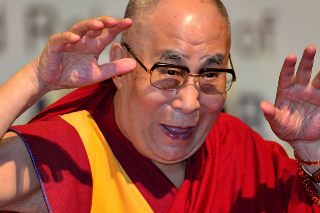 epa05884480 Tibetan spiritual leader the Dalai Lama gestures as he delivers a public lecture on 'Ancient Indian Knowledge in Modern Times', in Gauhati University campus in Guwahati, Assam, India, 02 April 2017. The Dalai Lama arrived for a week-long visit to north-east during which he is also expected to visit the state of Arunachal Pradesh. EPA/STR