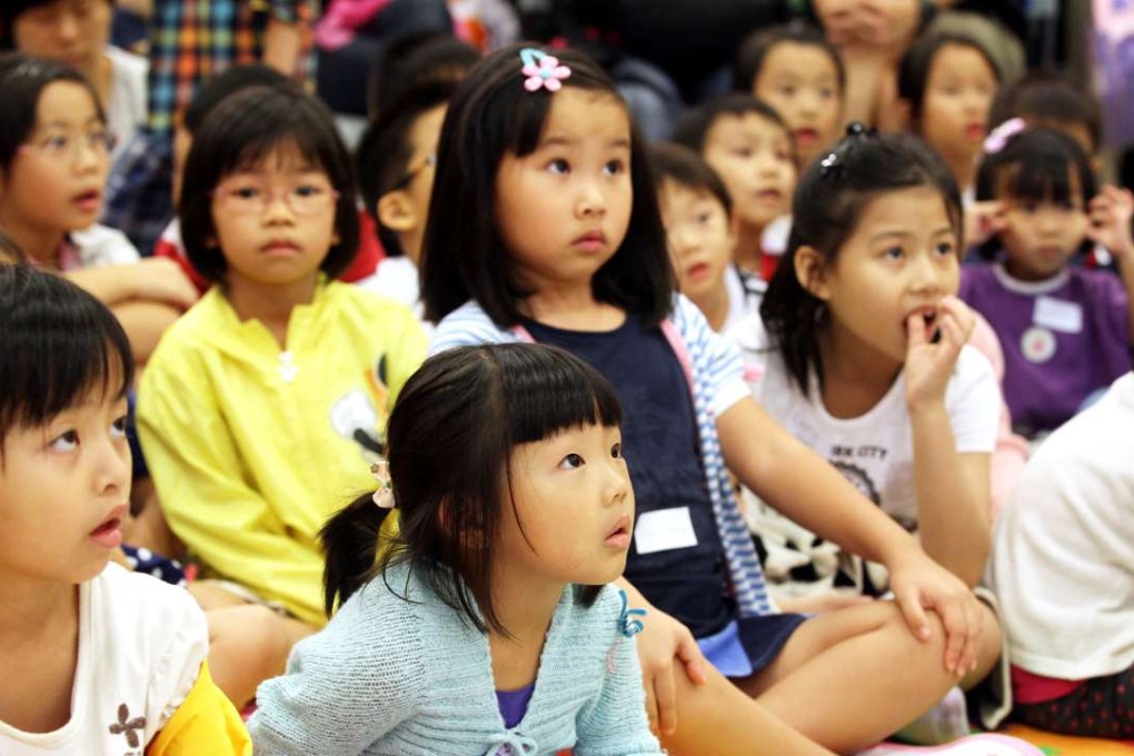 Children are all ears at a storytelling session in Hong Kong. Picture: SCMP