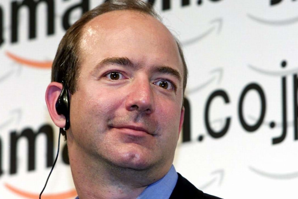 Jeffrey Bezos, founder and Chief Executive Officer of global online bookstore Amazon.com, listens to questions during a press conference in Tokyo in June 2001. Photo: AFP/Toru YAMANAKA