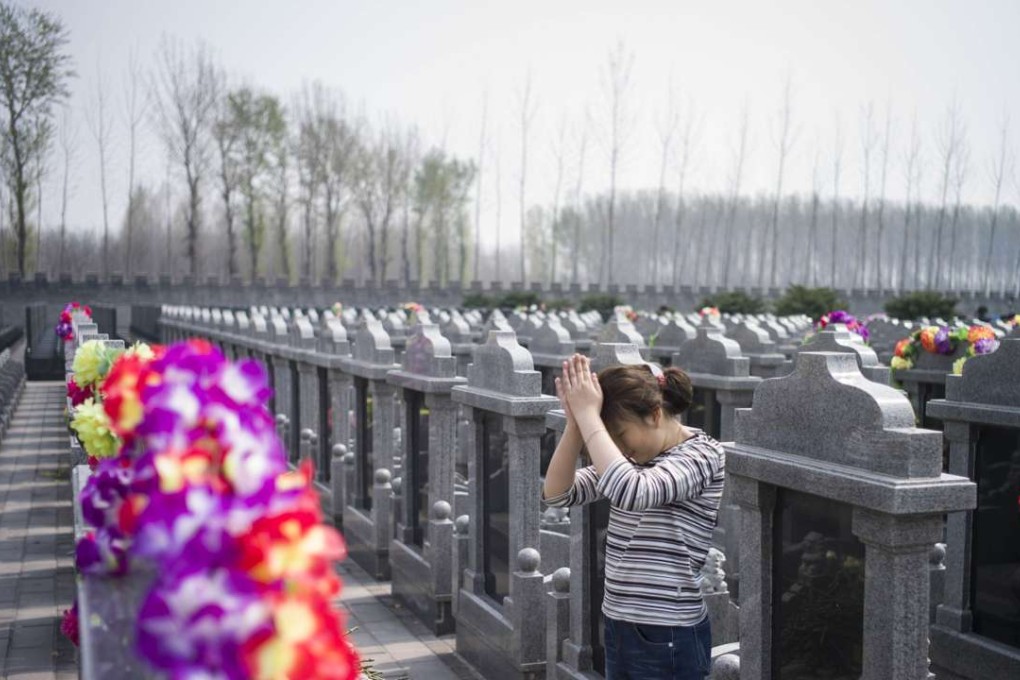 A woman prays at a cemetery in Dagantangcun, 30km east of Beijing, during last year’s Ching Ming festival. Photo: AFP