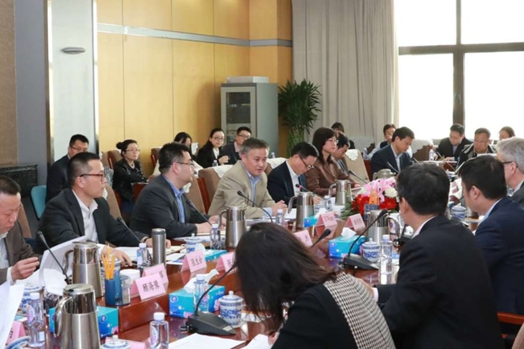A picture released by the State Administration of Foreign Exchange of its meeting with a group of delegates representing foreign businesses in China. Photo: Handout