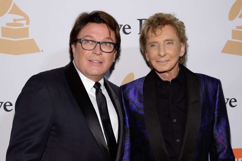 This photo taken on February 13, 2016 , shows Barry Manilow (right), with manager Garry Kief. Manilow on Wednesday confirmed that he was gay, that he and Kief have been together almost 40 years, and that they are married. Photo: AFP