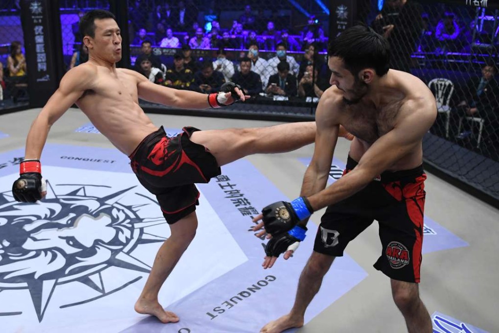 Wang Guan (left) in action. Photos: UFC