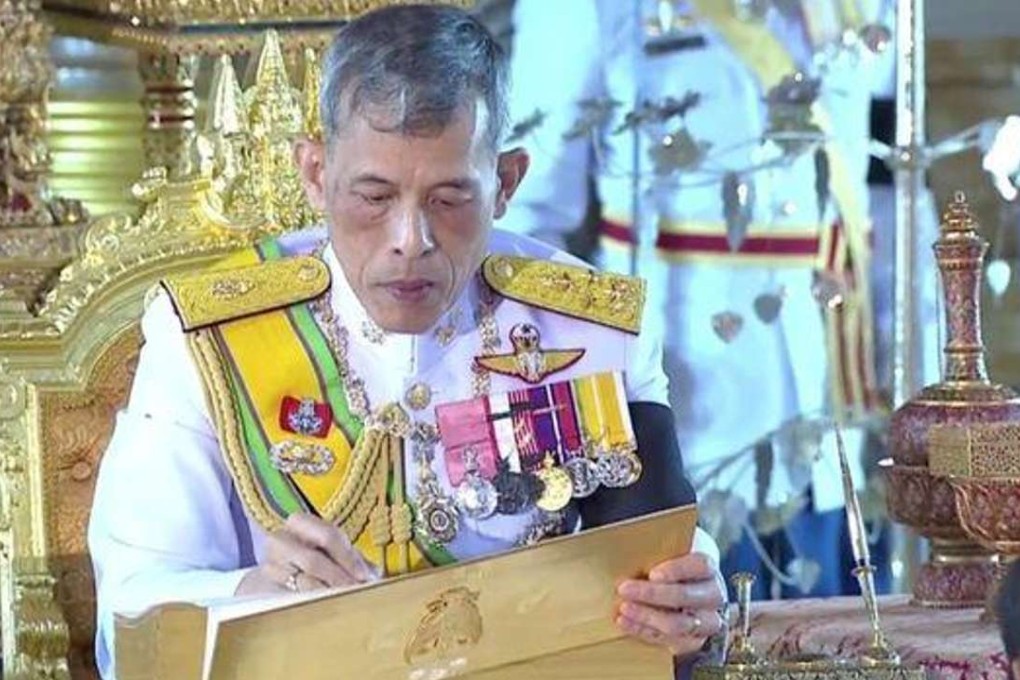 Maha Vajiralongkorn signed the document in a televised ceremony in Bangkok. Photo: Bangkok Post