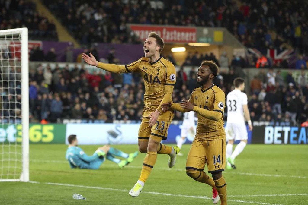 Tottenham Hotspur’s Christian Eriksen celebrates scoring his side’s third goal in the 3-1 win over Swansea. Photo: AP