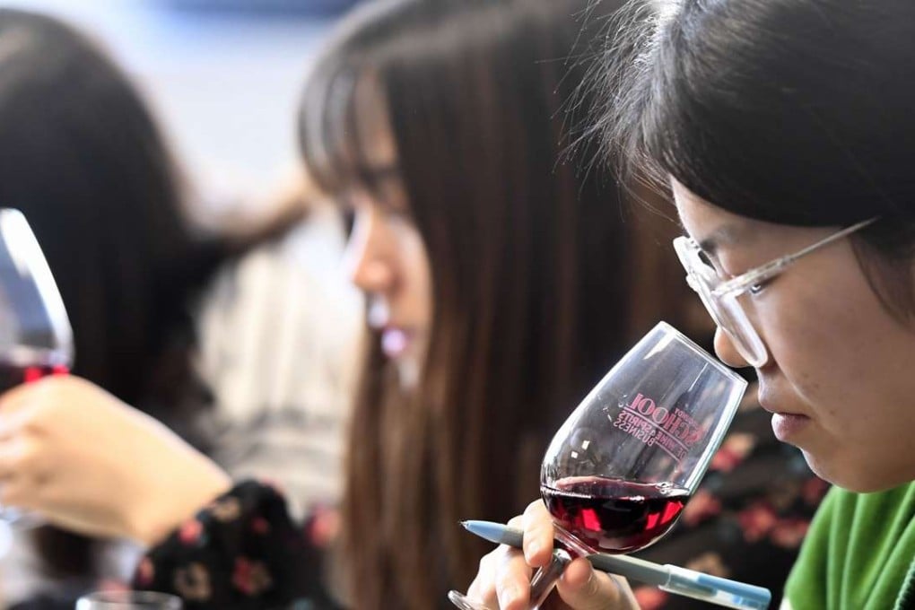 Chinese students taste and study wine during a class on March 16 at the School of Wine of the Dijon Business School. Photo: AFP
