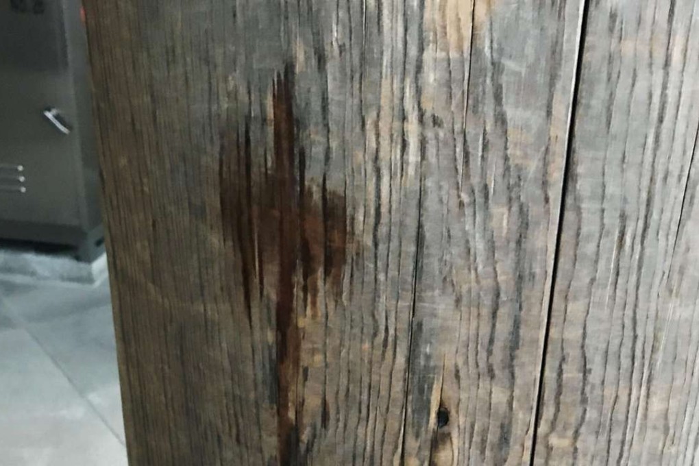 Stains, apparently traces of a liquid, are seen on a structure of Meiji Shrine, a Shinto site in Tokyo. Photo: Kyodo