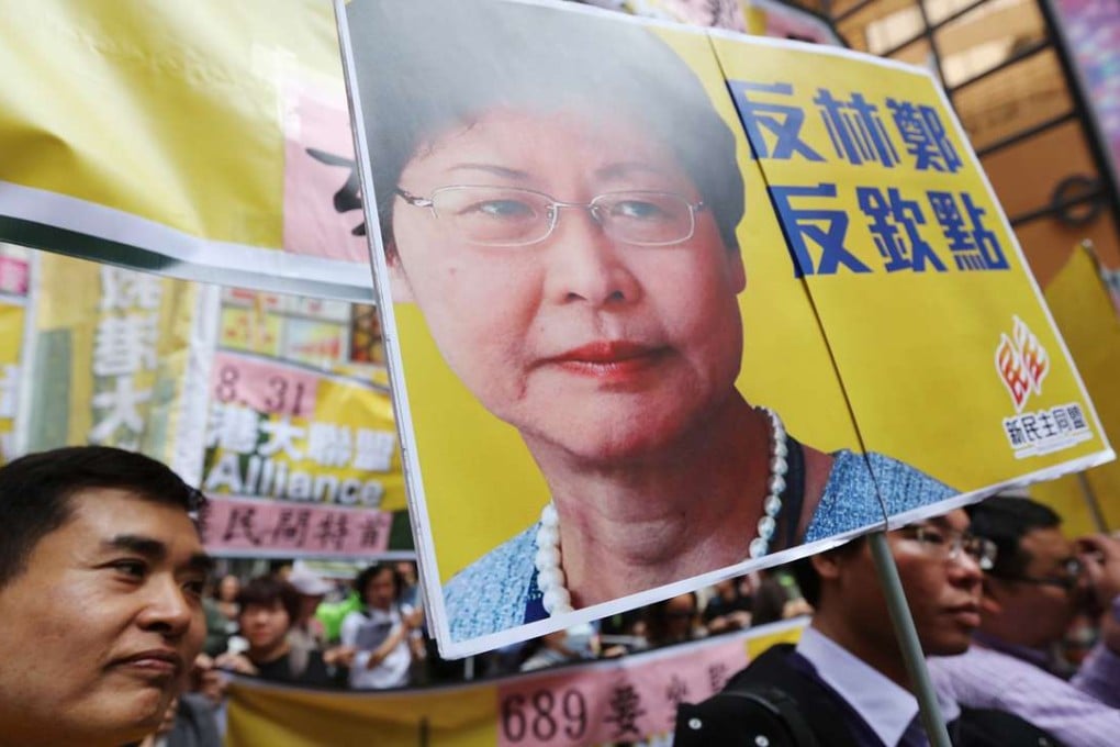 Pro-democracy supporters take part in a march in February against the small-circle chief executive election. Photo: Felix Wong