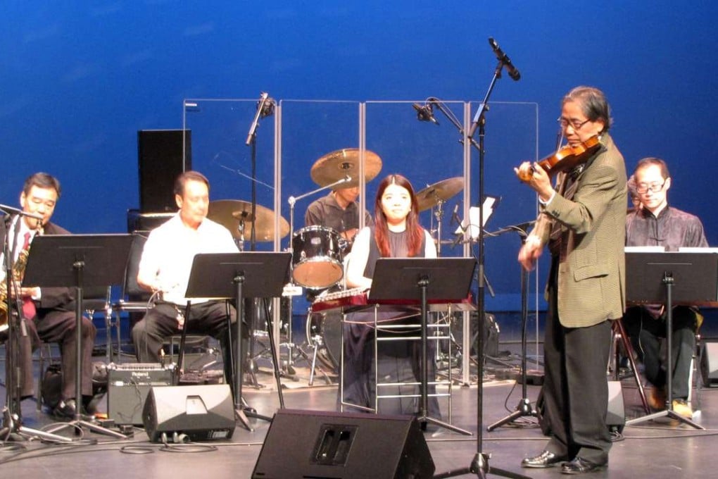 To Wing (front, on violin) and colleagues perform at Sai Wan Ho Civic Centre. Photo: Oliver Chou