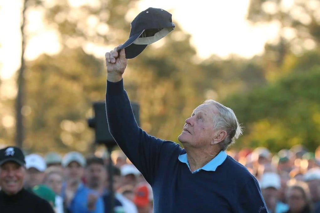 In a salute to the king of golf, Jack Nicklaus tips his hat toward heaven in honour of the late Arnold Palmer with Gary Player looking on while they hit their tee shots during the ceremonial start of the Masters at Augusta National Golf Club on Thursday, April 6, 2017, in Augusta, Georgia. Photo: Atlanta Journal-Constitution/TNS