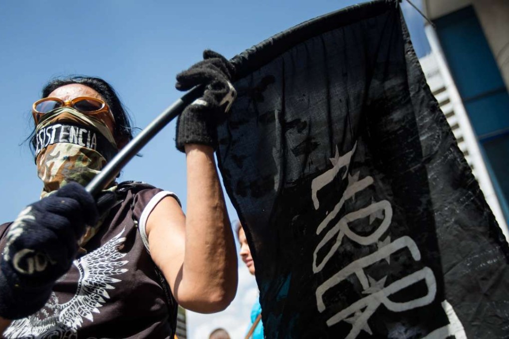 Opposition protesters march during a demonstration against the government in Caracas, Venezuela as the protests intensified. Photo: EPA