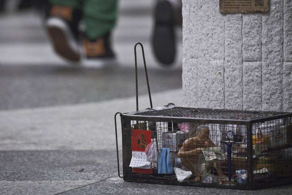 Model of Cage home design by Kwong Chi-kit, creative director for SOCO's 'Cage Homes' campaign.