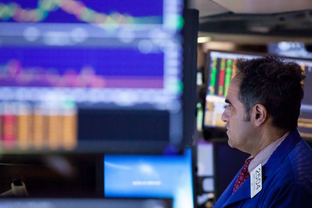 A trader on the floor of the New York Stock Exchange as financial traders await the results of the summit meeting between US President Donald Trump and Chinese President Xi Jinping. Photo: Bloomberg