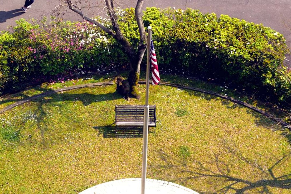 A US flag flies in the courtyard of the American Institute in Taiwan, in Taipei, on Wednesday. Photo: EPA