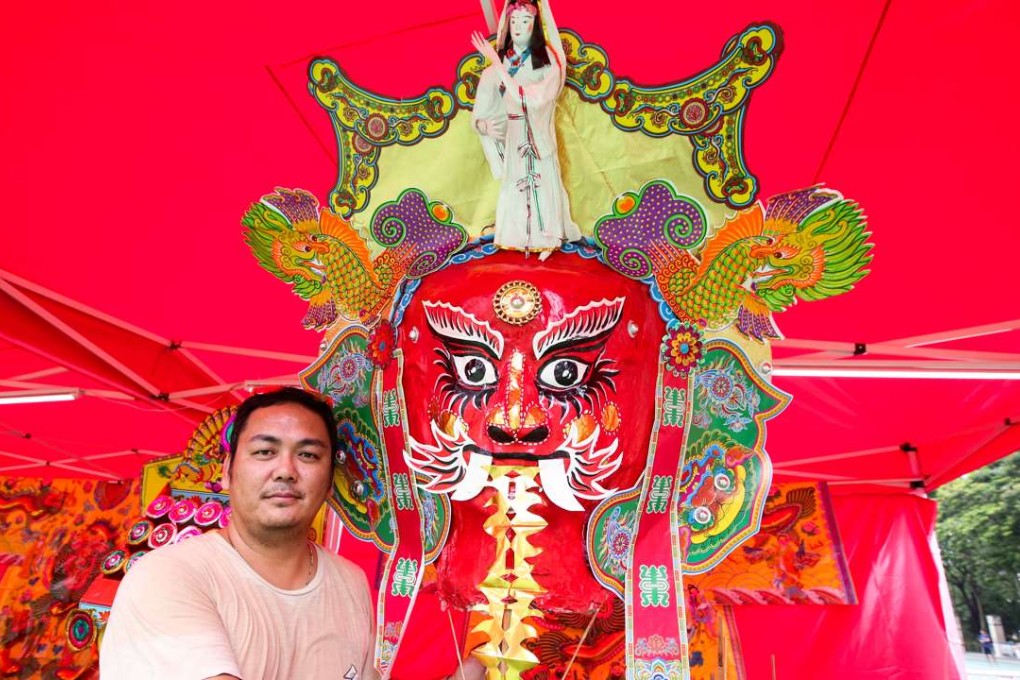 Kenneth Mo Cheuk-kei is one of the remaining craftsmen making traditional paper masks. Photo: Edward Wong