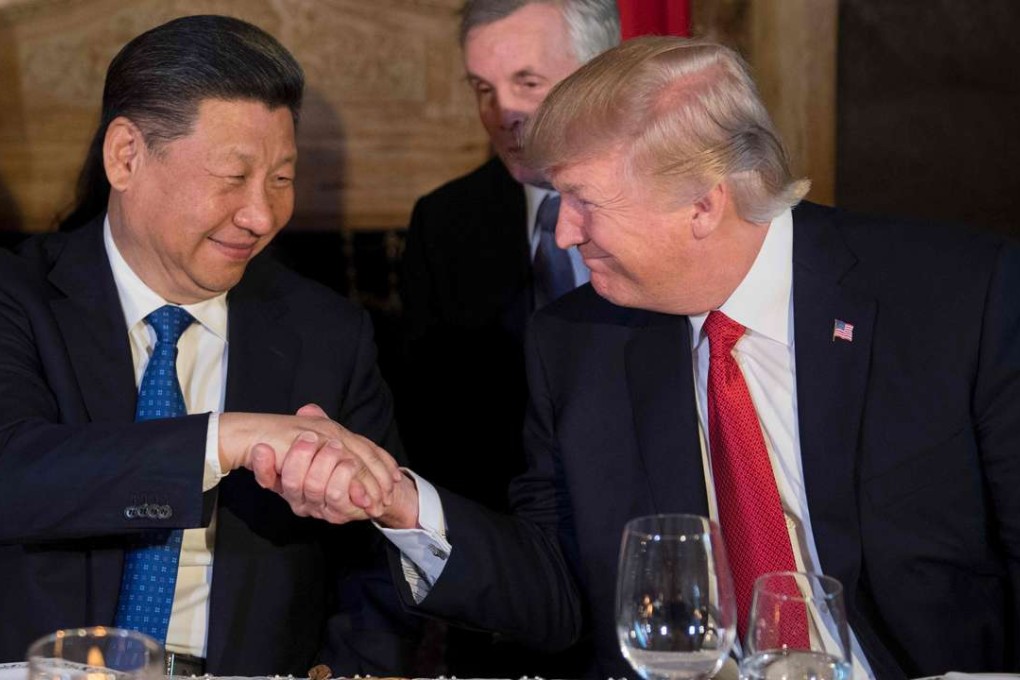 Chinese President Xi Jinping shake hands with US President Donald Trump during dinner at the Mar-a-Lago estate in Florida on Thursday. Photo: AFP