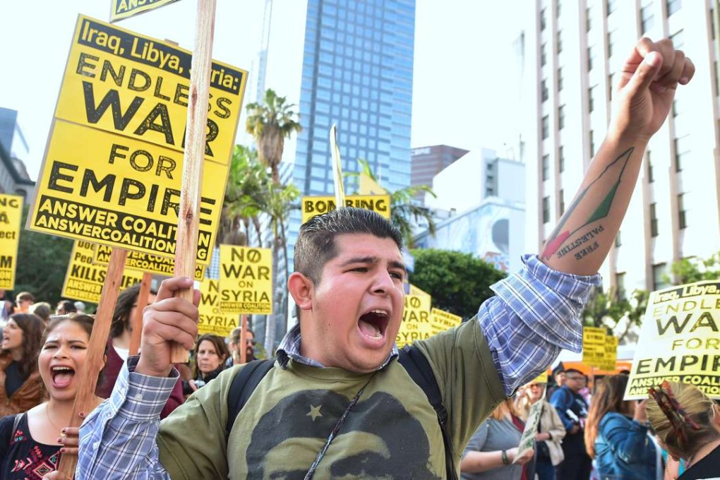 Demonstrators protest against the US attack on Syria in Los Angeles on April 7, 2017. Photo: AFP