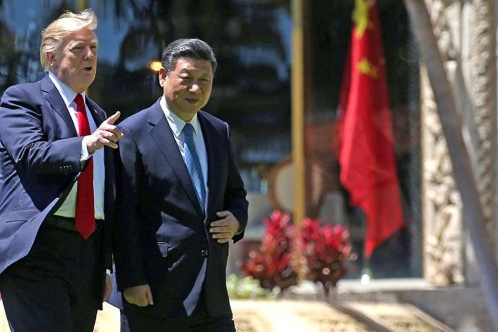 US President Donald Trump (L) and China's President Xi Jinping walk together after a bilateral meeting at Trump's Mar-a-Lago estate in Palm Beach, Florida. Photo: Reuters