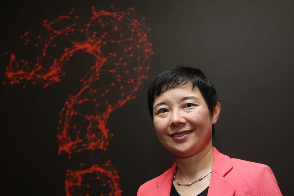 Li Ting, executive director and chief executive of Yunfeng Financial, says none of her staff have been able to beat the company’s new robo adviser app. Photo: David Wong