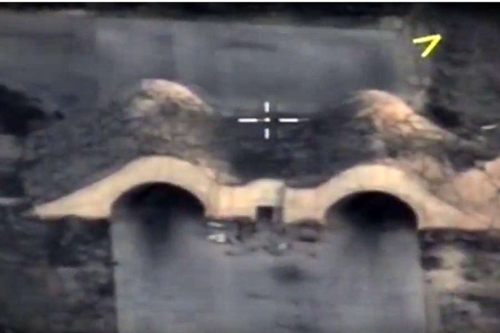 A handout grab image made available by the Russian Defence Ministry's press service shows a hangar at the Shayrat airbase after it was hit by US strike. Photo: AFP