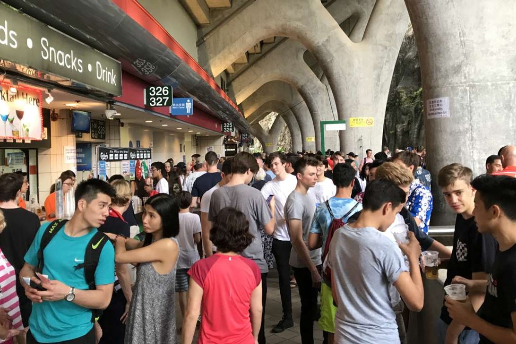 People gather on the concourse at Hong Kong Stadium drinking during the Hong Kong Sevens. Photos: Handout