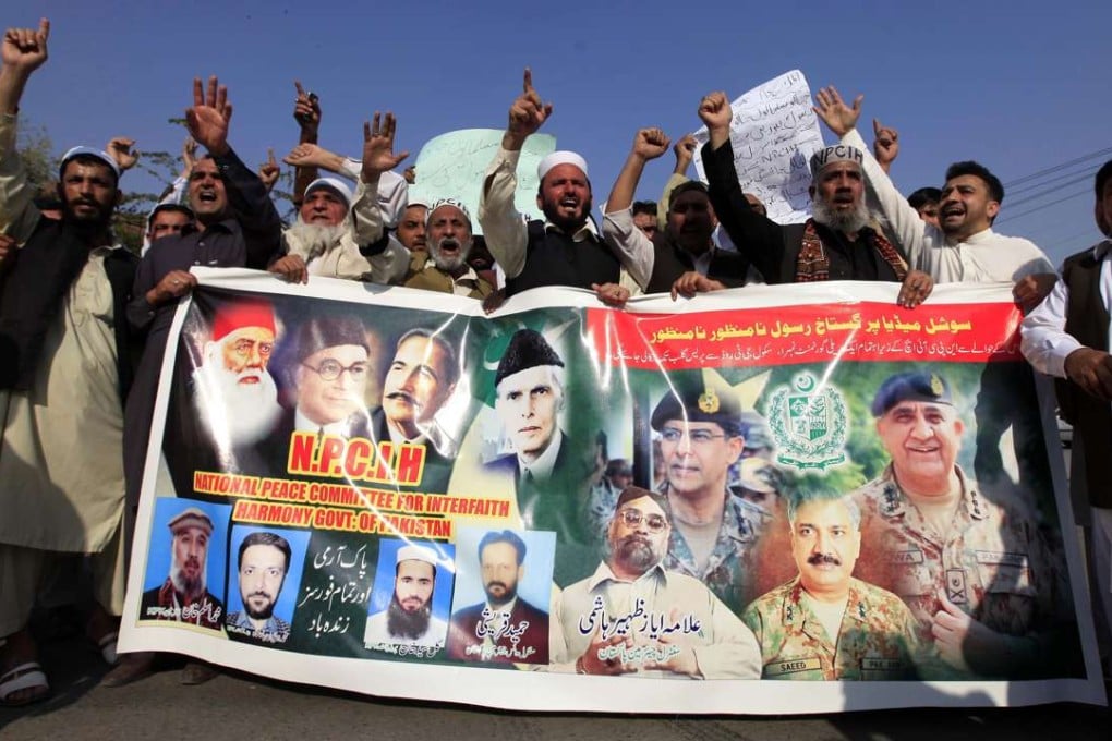 Protesters in Peshawar, Pakistan, urge the authorities to block social media sites that they say are spreading blasphemous content, at a rally held last month. Photo: EPA