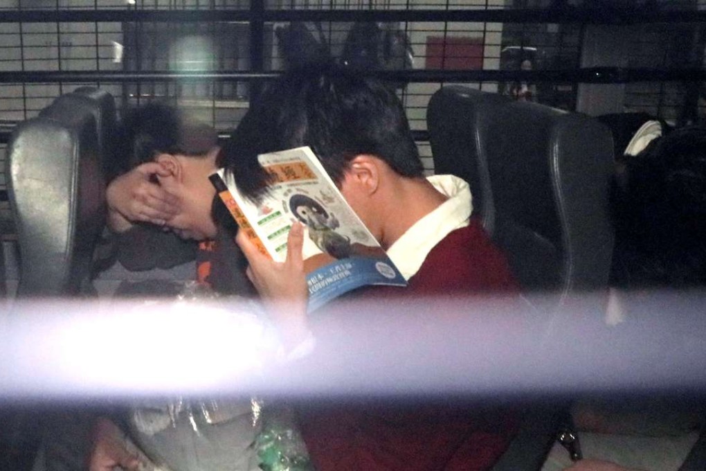 Yeung Ka-lun being escorted by Correctional Services Department officers out of the District Court in Wan Chai. Photo: Handout