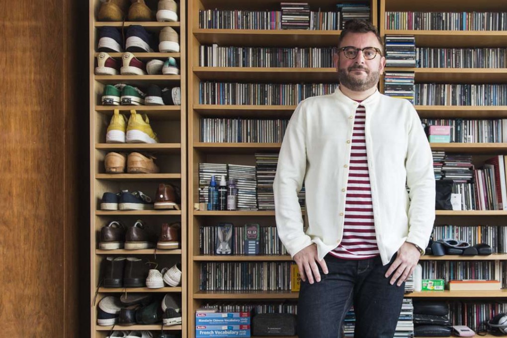 Arnault Castel wears a white shirt, T-shirt and jeans from his clothing label Future Classics. Photo: Michelle Wong