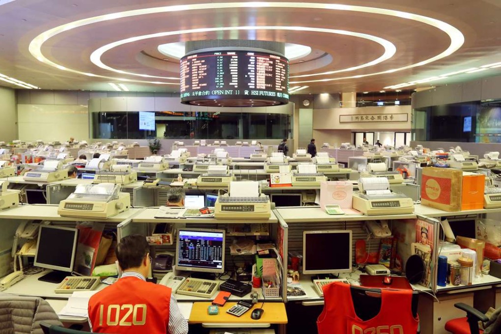 Floor traders are seen at the Hong Kong stock exchange in Central. 07JAN16 SCMP/ Dickson Lee