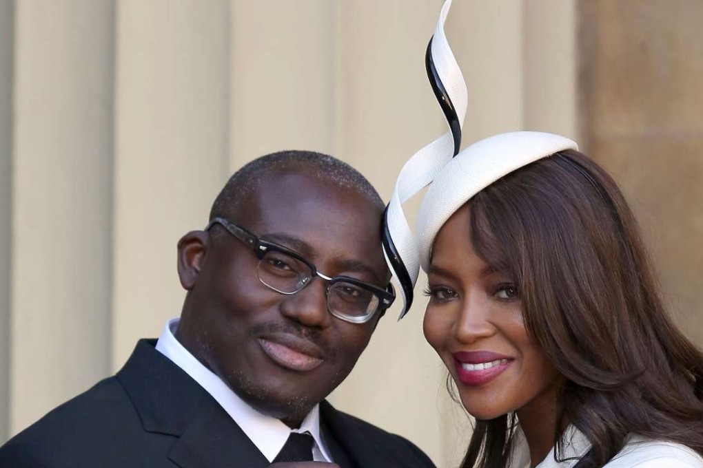 Model Naomi Campbell poses with Edward Enninful after he received his OBE at Buckingham Palace in October 2016. Photo: Reuters//Pool
