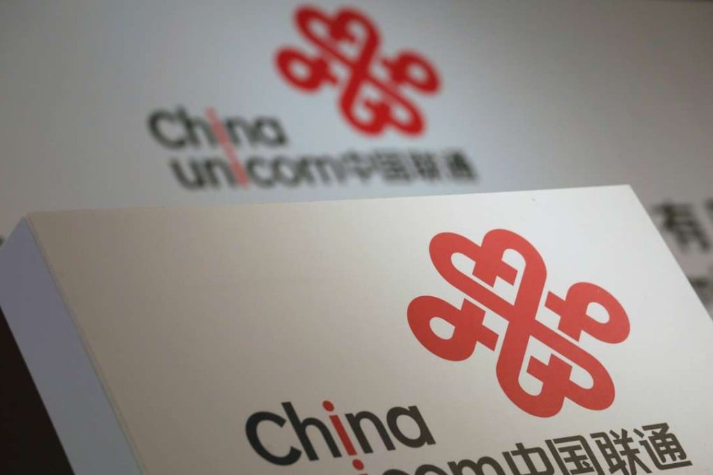 The logo of China Unicom on display at a news conference during the company's announcement of its FY2015 results in Hong Kong. Photo: REUTERS